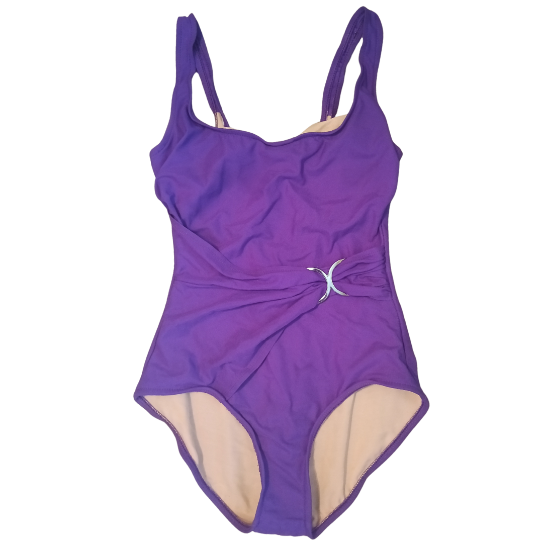 Purple swimsuit with cut-out design on a white background